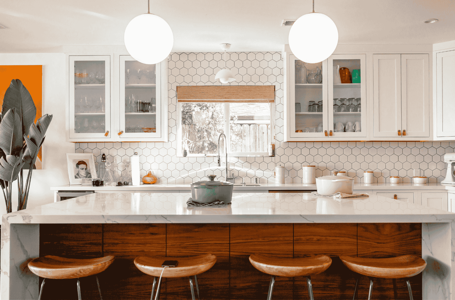 Bright kitchen showcasing furnished rental amenities in a move-in ready rental home