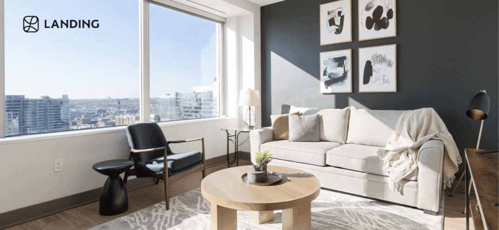 HelloLanding furnished apartment in an urban high-rise, offering modern furniture, essential amenities, and flexible membership-based living for remote professionals.