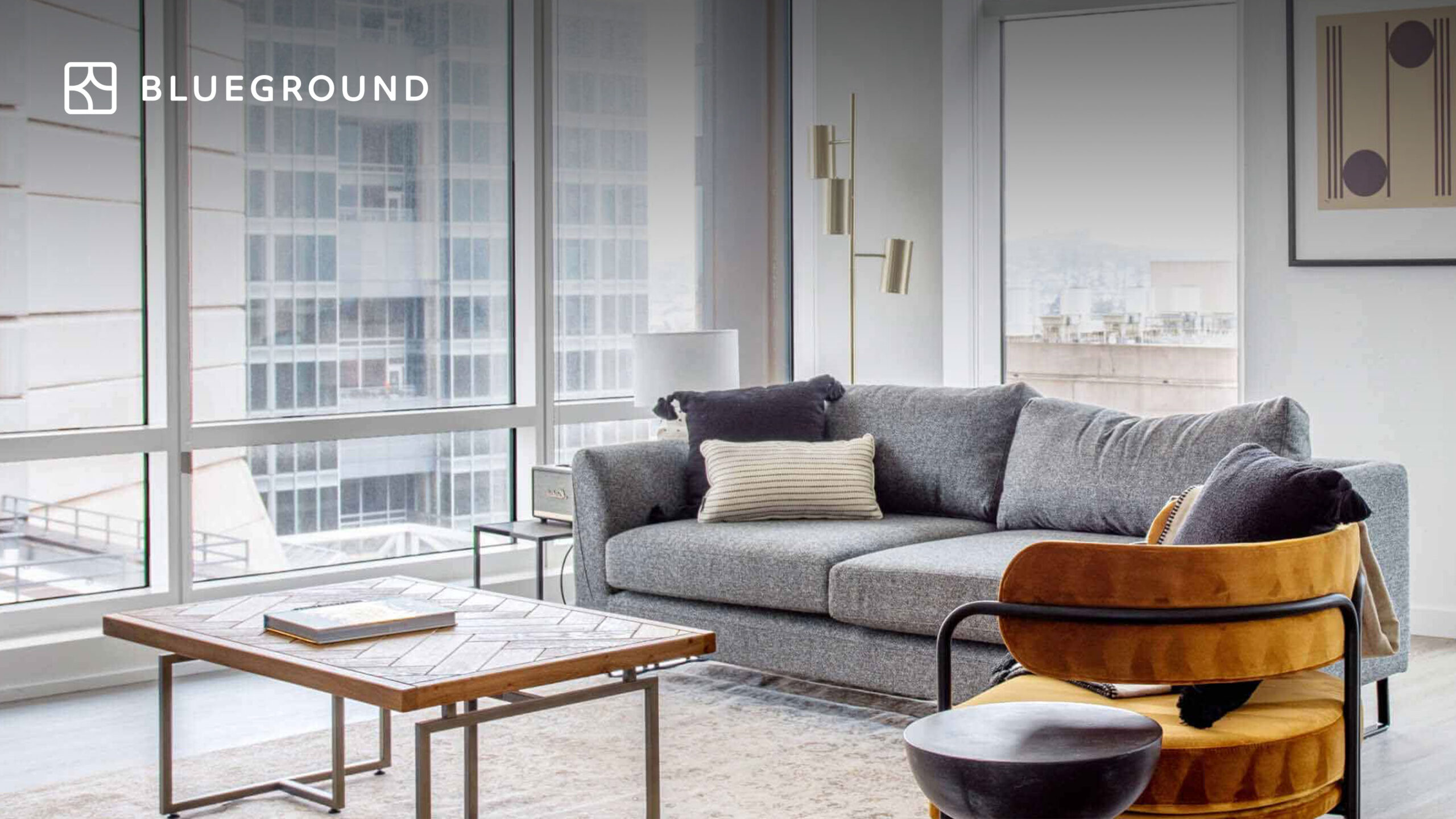 Blueground furnished apartment with modern interior design, neutral tones, and turnkey setup for professionals seeking flexible mid-term housing.